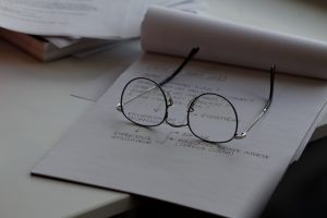 Glasses on notepad